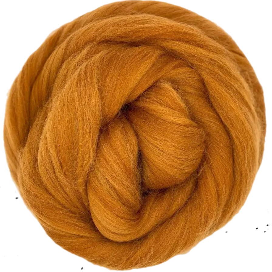 Ball of orange yarn on a white background