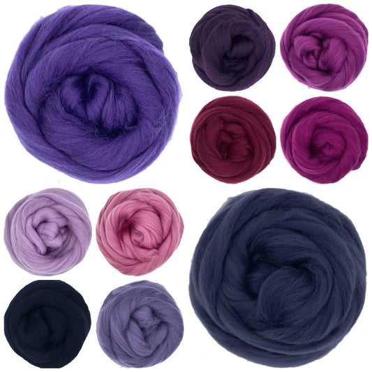 Very Berry Collection of various purple and blue yarn balls on a white background