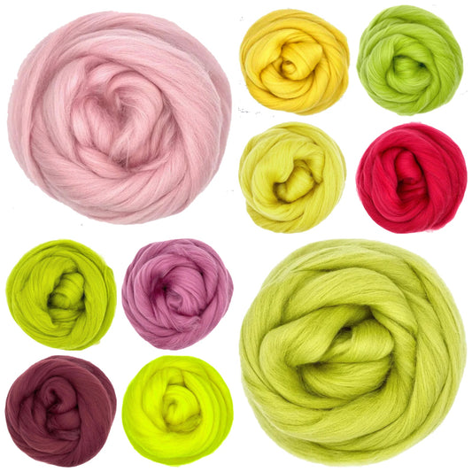 Assorted colorful yarn balls on a white background
