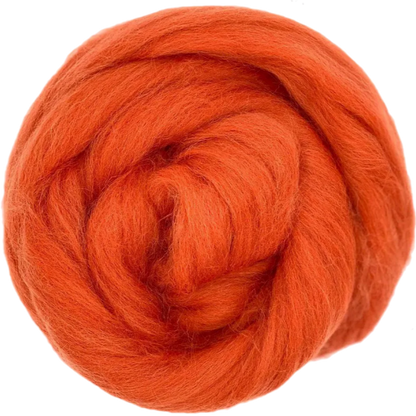 Ball of bright orange yarn on a white background