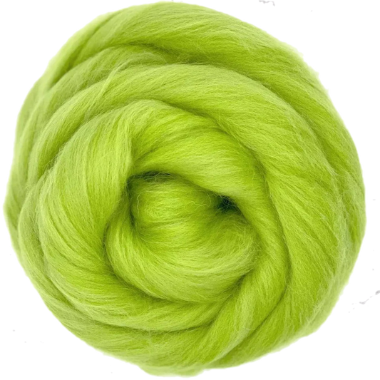 Ball of bright green yarn on a white background