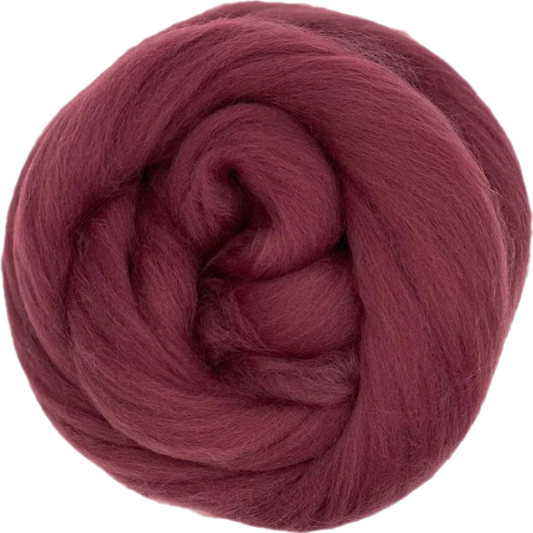 Ball of dark red yarn on a white background