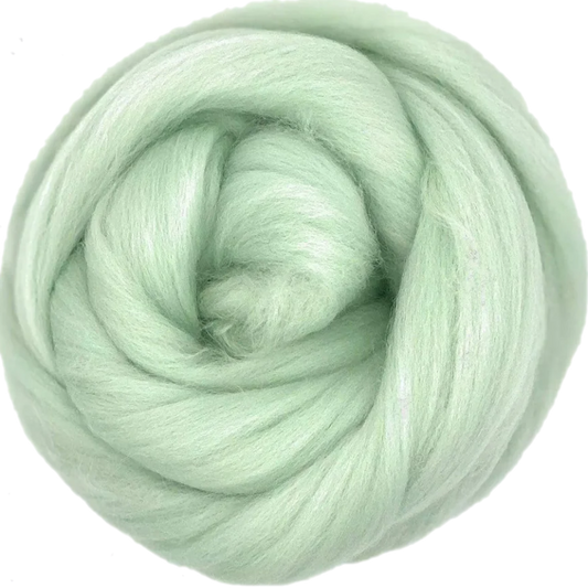 Light green skein of yarn on a white background