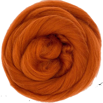 Ball of orange yarn on a white background