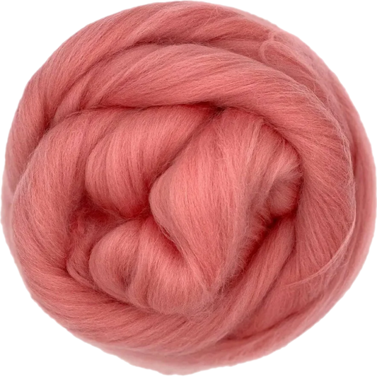 Ball of pink yarn on a white background